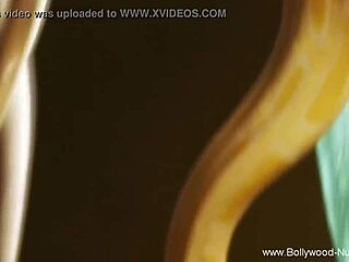 The beautiful indian woman performs a seductive dance to arouse her partner.