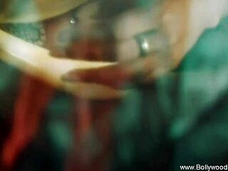 The beautiful indian woman performs a seductive dance to arouse her partner.