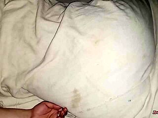 always peepin my beautiful mom big boobs while she sleepin in bed