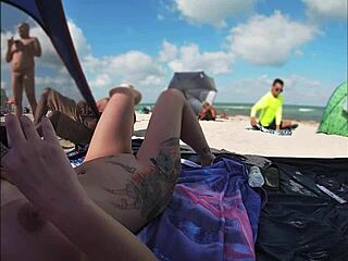 Exhibitionist wife Mrs. Kiss shares nude beach POV of voyeur jerking off while men watch her