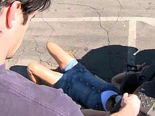 Sexy brunette mechanic on sofa