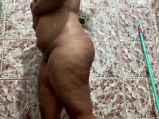 brunette with big tits showing off in the shower