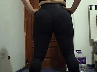 madura captivates while doing squats in tiny thong during steamy workout.