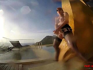 sexy mature red xxx teases herself with a dildo by the pool