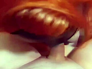 Amateur redhead wife slurps cock, getting creampie with big natural tits.