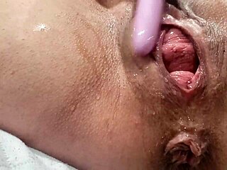 Latina mature dominates with dildo, showing off wild squirting skills in solo toy play.