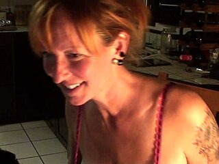 Cute canadian redhead couple shares loving moments in the kitchen. Their bond feels so warm and genuine.