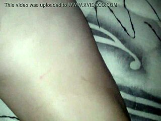 The wife is experimenting with a dildo