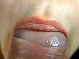 extreme close-up of young blonde babe giving intense homemade blowjob to gay couple