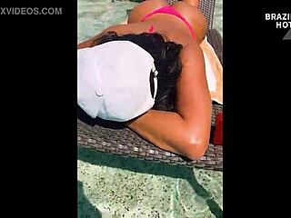Showing off my microbikini at hotel pool for a hot brazilian menage