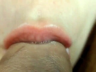 extreme close-up of young blonde babe giving intense homemade blowjob to gay couple