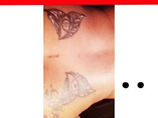 i'm npleasures showing off my new ass tattoo