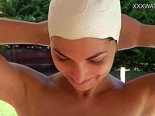 This horny hungarian brunette smokes while masturbating naked on her small tits