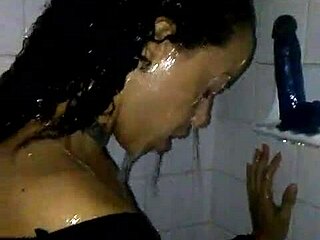 Brook Starr plays with toys and long black cock in shower