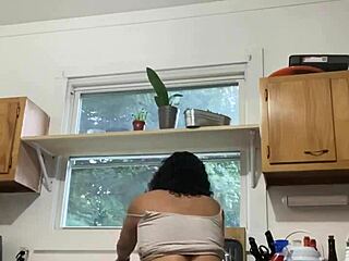 latina milf having fun while doing dishes