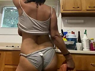 latina milf having fun while doing dishes