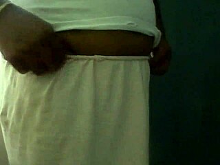 Aparna wearing petticoat and panties in a simple movement video.