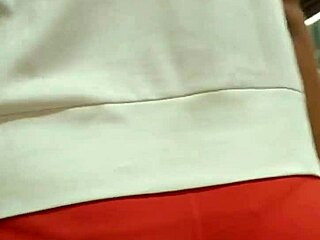 Hey, check out this hot girl flaunting her nice ass in tight shorts at the market, cameltoe peeking through