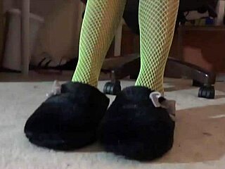 ebony amateur worships green fishnets in interracial domination scene