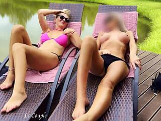 Two girlfriends stroke and sunbathe nude outdoors. Real amateur heat in open air!