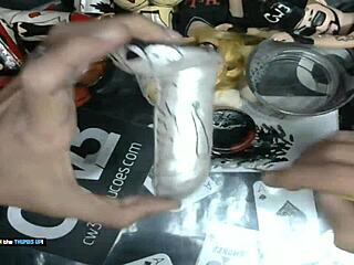 it's time to wrap up painting the little grey alien with dildo art for business