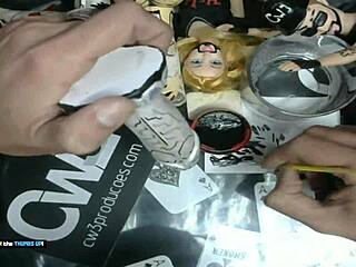 it's time to wrap up painting the little grey alien with dildo art for business