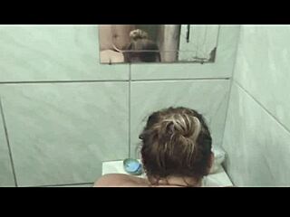 In the bathroom, the wife enjoys a big ass bath with amateurs.