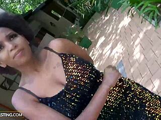 African casting - busty ebony in sequin dress impressed by the size