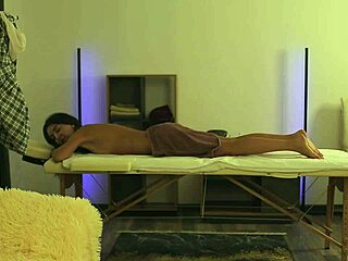 The masseur says, 'Your tight pussy is irresistible,' then fucks her passionately on the table