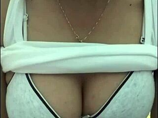 em ngực bự shows off big tits on webcam.