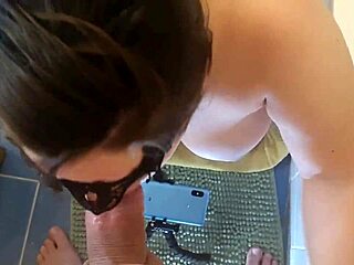 Oh yes, this busty slut wife is loving that thick cock deep in her throat! She's licking balls and swallowing cum in the bathroom.