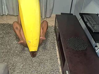 tattooed indian slut humps banana in close-up