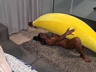 tattooed indian slut humps banana in close-up