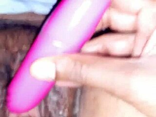 Indian wife in oiled scene with cucumber