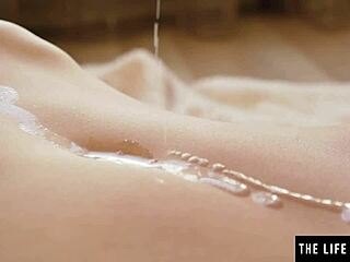 cute teen 18+ oils up her shaved pussy and masturbates to an orgasm, close-up on clit and small tits.