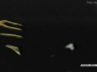 Kathleen Beller topless in Surfacing 1981, revealing retro nude charm. What hidden desires surface in this classic scene?