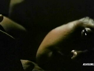 Kathleen Beller topless in Surfacing 1981, revealing retro nude charm. What hidden desires surface in this classic scene?