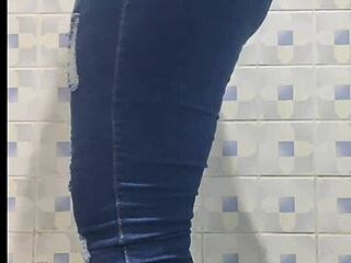 mature latina ann shakes her ass in leggings and fishnets during hidden camera bathroom worship.