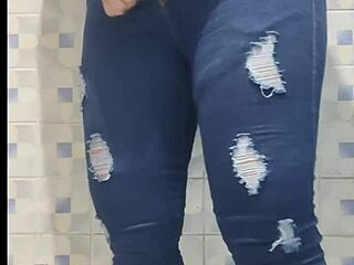 mature latina ann shakes her ass in leggings and fishnets during hidden camera bathroom worship.