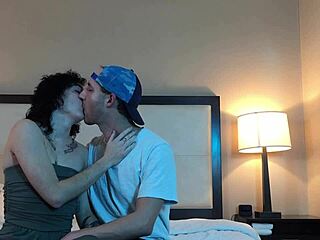 Making out passionately with this hot petite tattooed woman