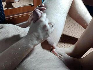 Brunette couple jerks off in homemade close-up