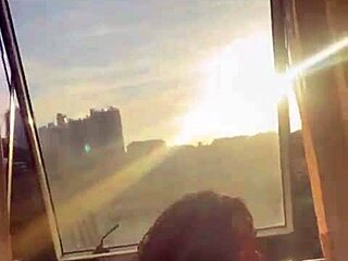 Brazilian couple gets naughty by the window for neighbors to see