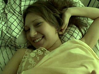 pulling her pink panties down to keep masturbating, georgia f on the bed