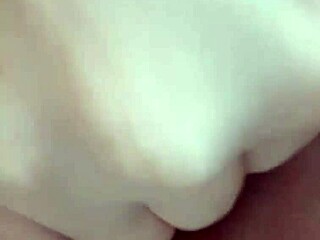 This big-ass milf casually fingers her hot pussy in the room.