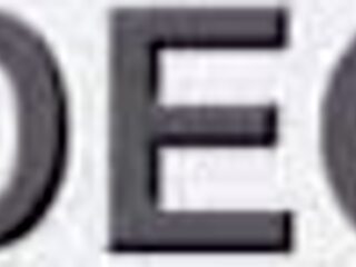 Redhead nurse teasing at the gloryhole