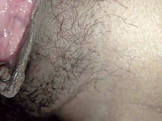 Watch the water squirt into the big girl's tight pussy until it's soaking wet.