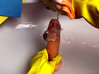 I love watching this hot housewife clean her dildo after play