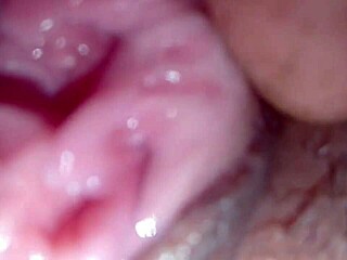 Watch the water squirt into the big girl's tight pussy until it's soaking wet.