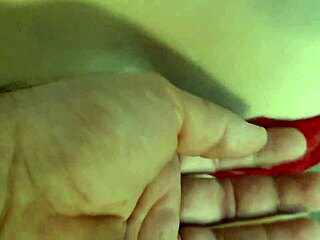 The petite wife experiences her first golden shower in the shower, getting horny.