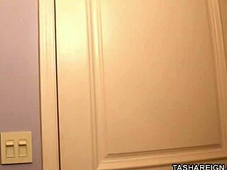 Tasha reign slides her glass dildo in her cunt.